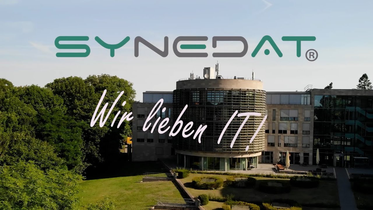 SYNEDAT-Unternehmensfilm mit dem Firmengebäude und dem Schriftzug ‚Wir lieben IT!‘.